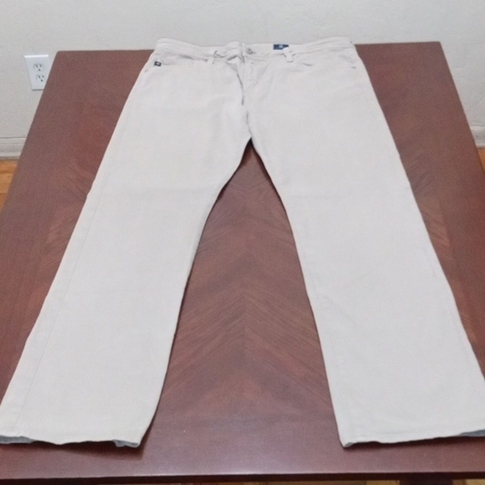 AG Adriano Goldschmied Men's Jean. Color Cream. Size 38X34.
